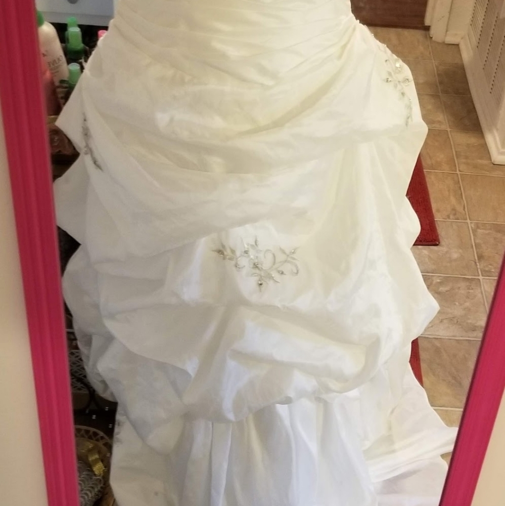 beautiful silk wedding dress with poofy ruffles